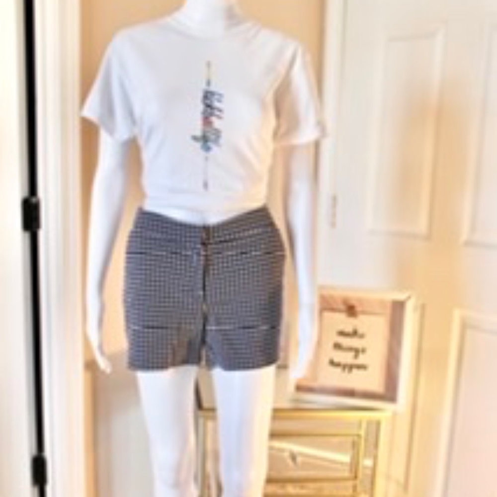 British Khaki blue thick shorts with white polka dots. Size 4